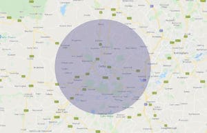 A map of Derby with a blue circle marking a 8-mile radius.